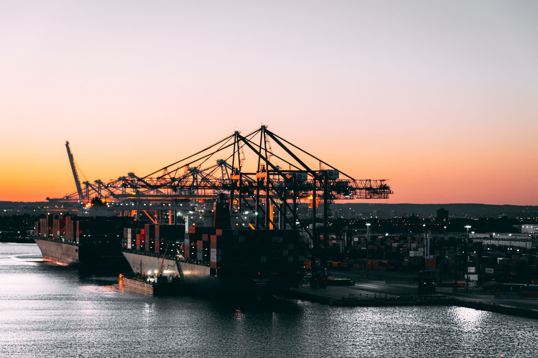 Vehicles being loaded at a shipping port for export