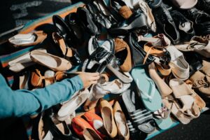 Premium sandals displayed on retail shelves at full price