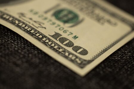 Stack of U.S. Treasury bond certificates representing government debt markets