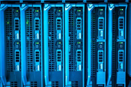 Rows of servers inside a modern data center representing cloud infrastructure growth