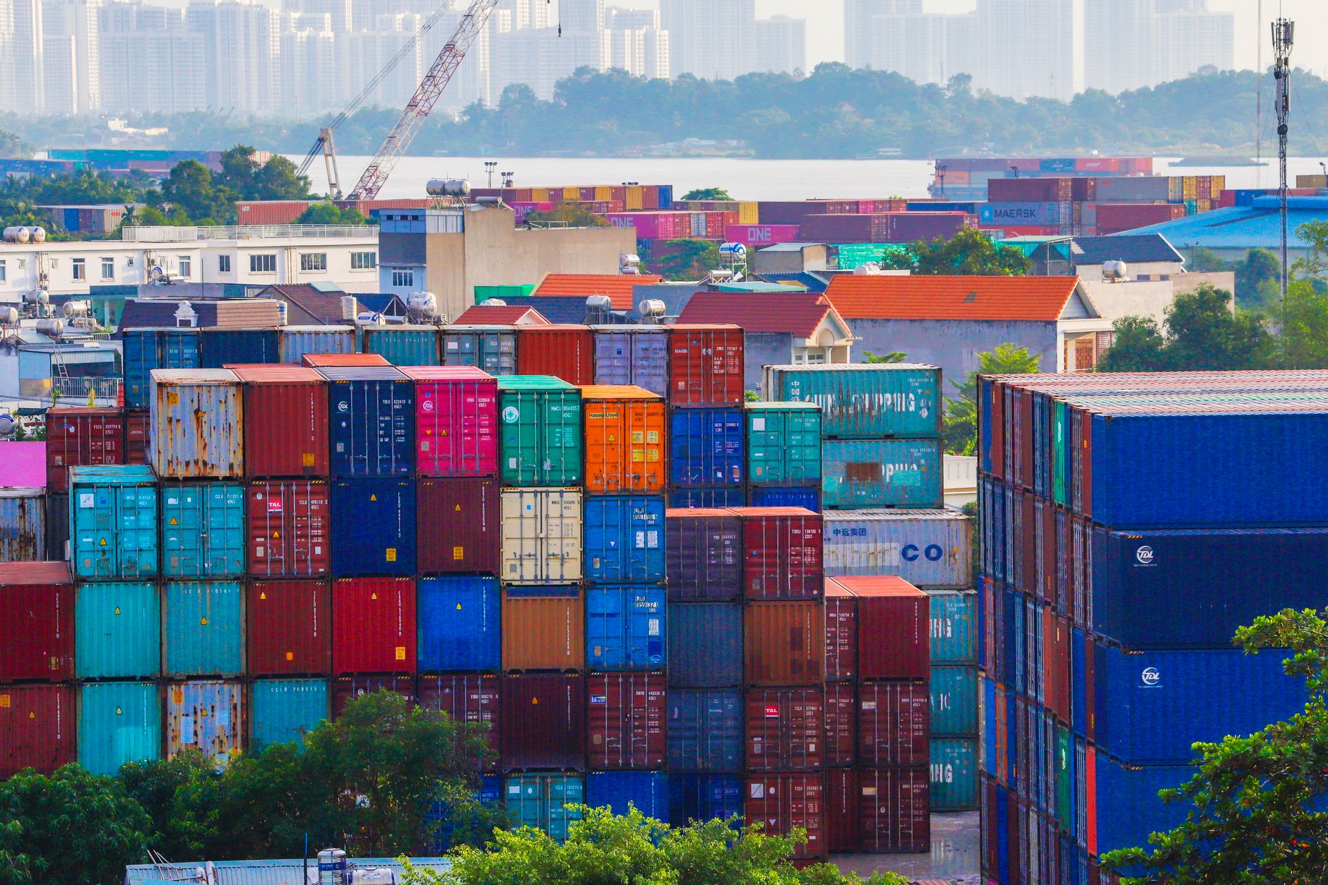 Container ships at a busy international port representing U.S.-China trade flows