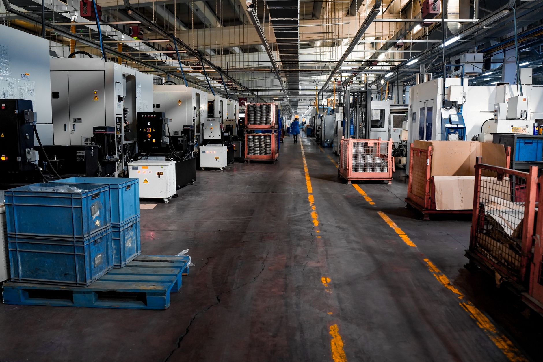 Workers on an electronics manufacturing assembly line