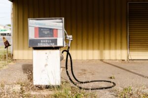 Close-up of a diesel fuel pump nozzle at a commercial filling station