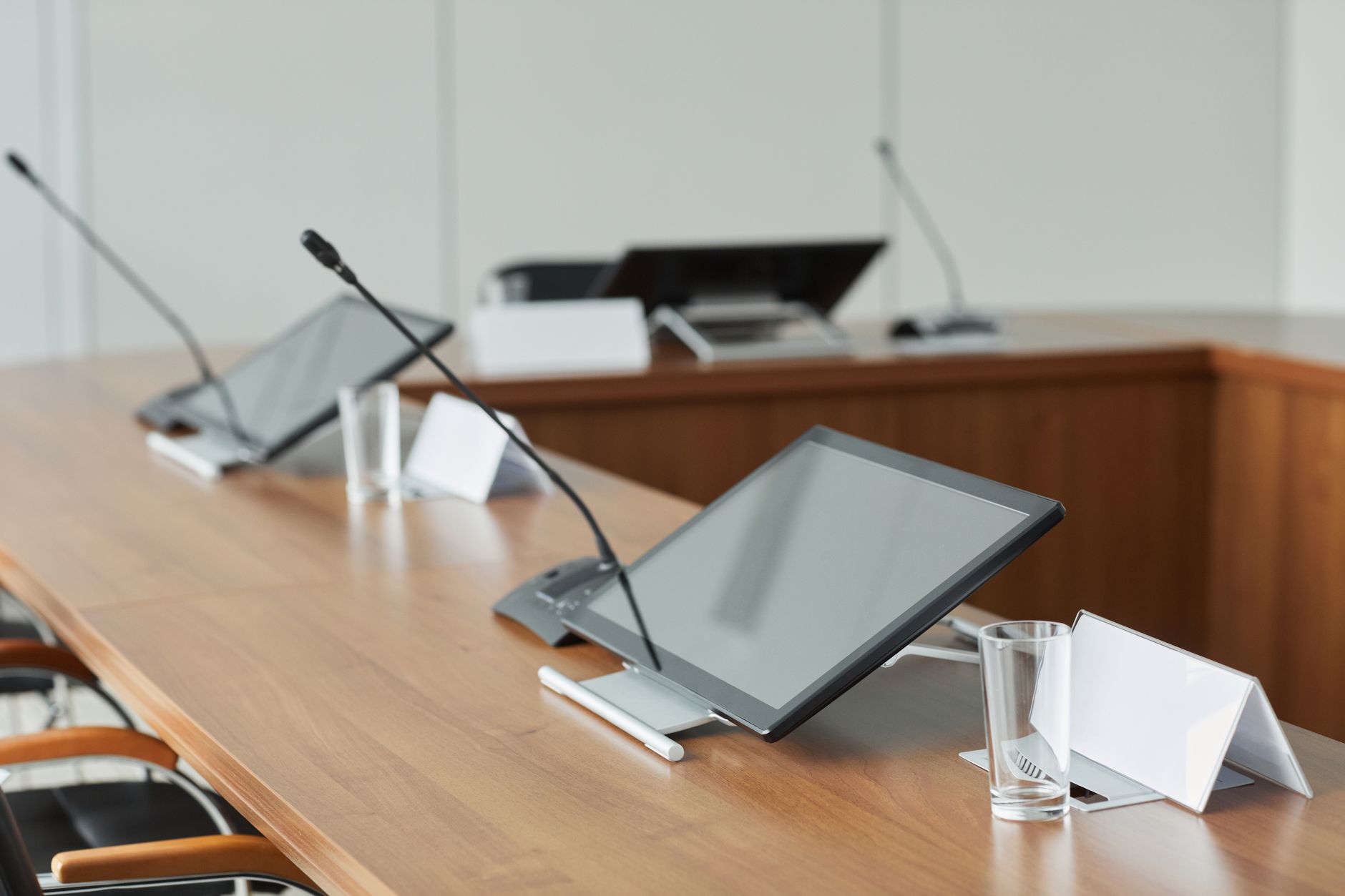 Corporate boardroom representing a major media acquisition deal
