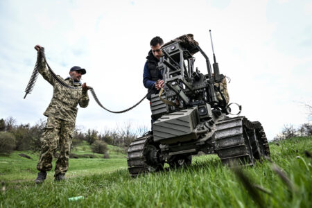 Military drone on an open field representing frontline robotic warfare