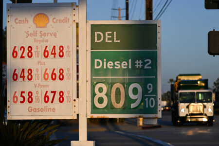 A large diesel fuel tanker truck on a highway